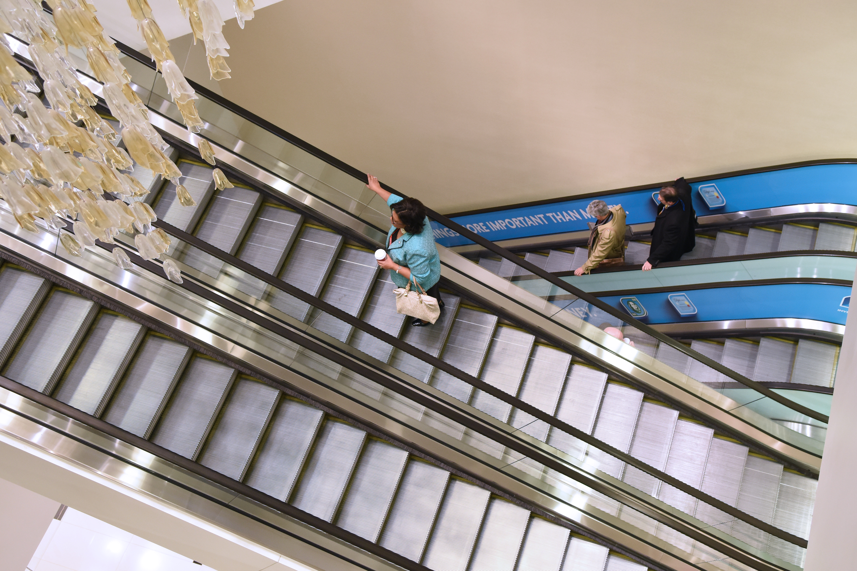 ACE2018 attendees on branded escalator