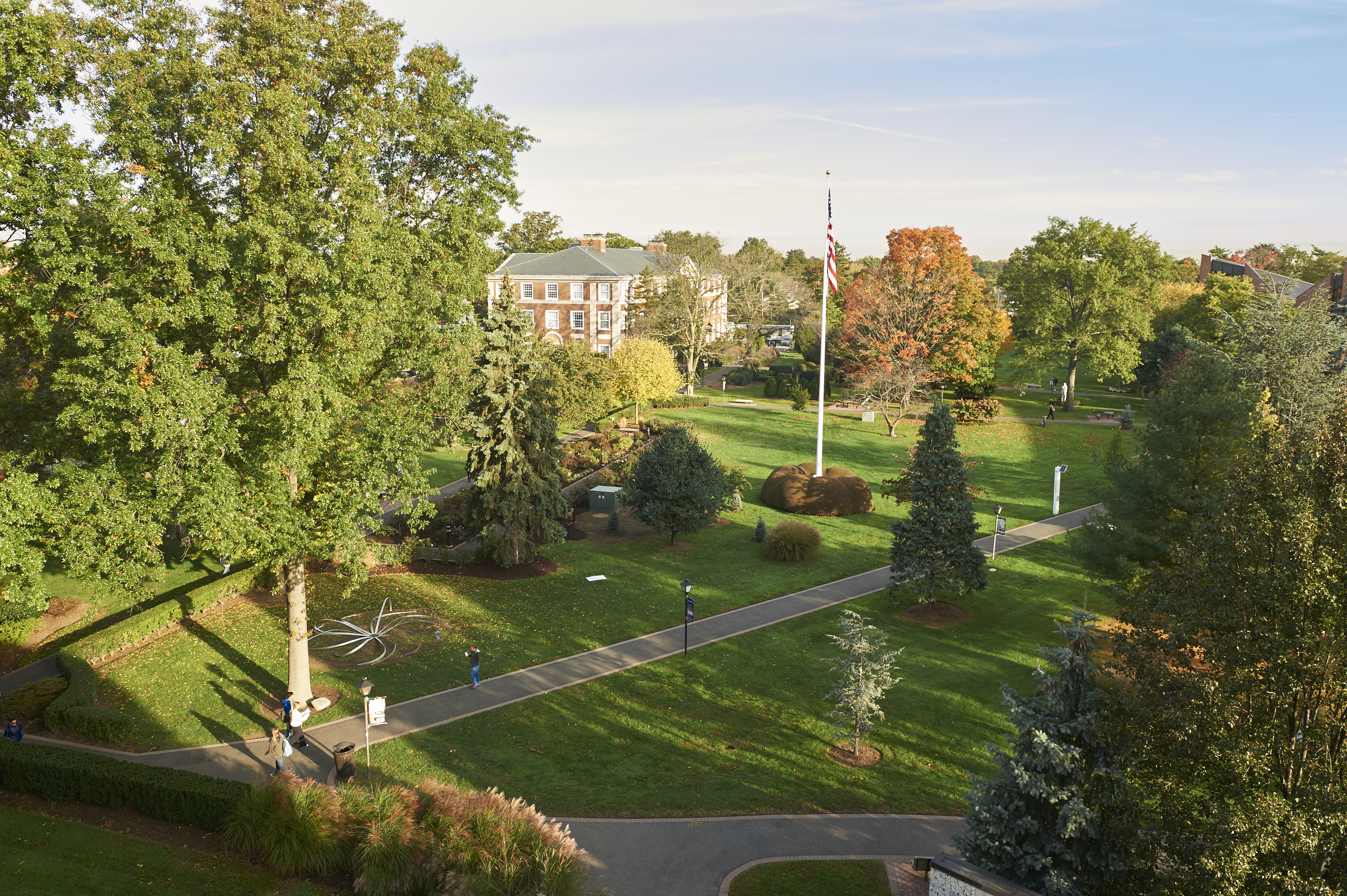 Picture of a campus on a fall morning. 