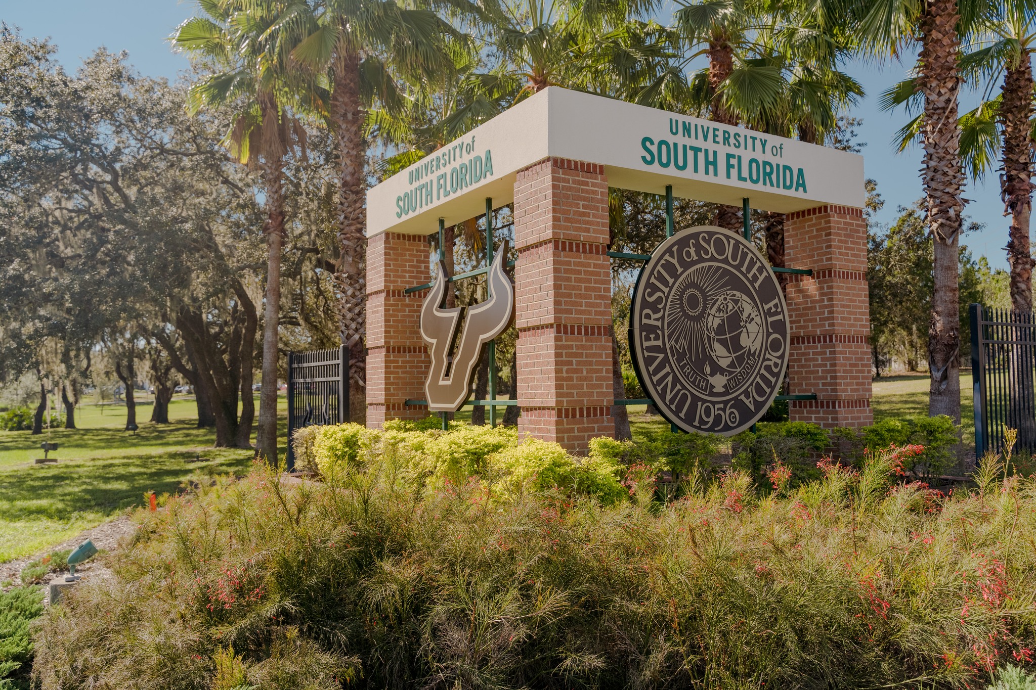 Image of University of South Florida gate showing the school's seal.