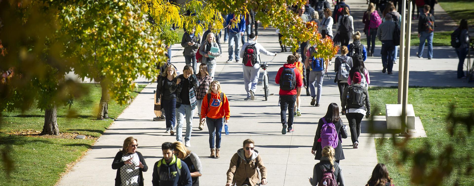 Picture of students walking on campus.