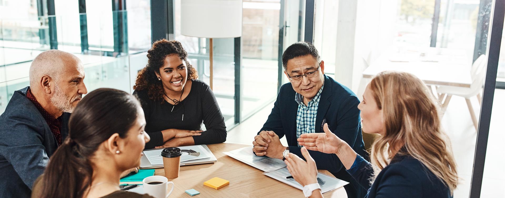 Picture of faculty members in a group discussion