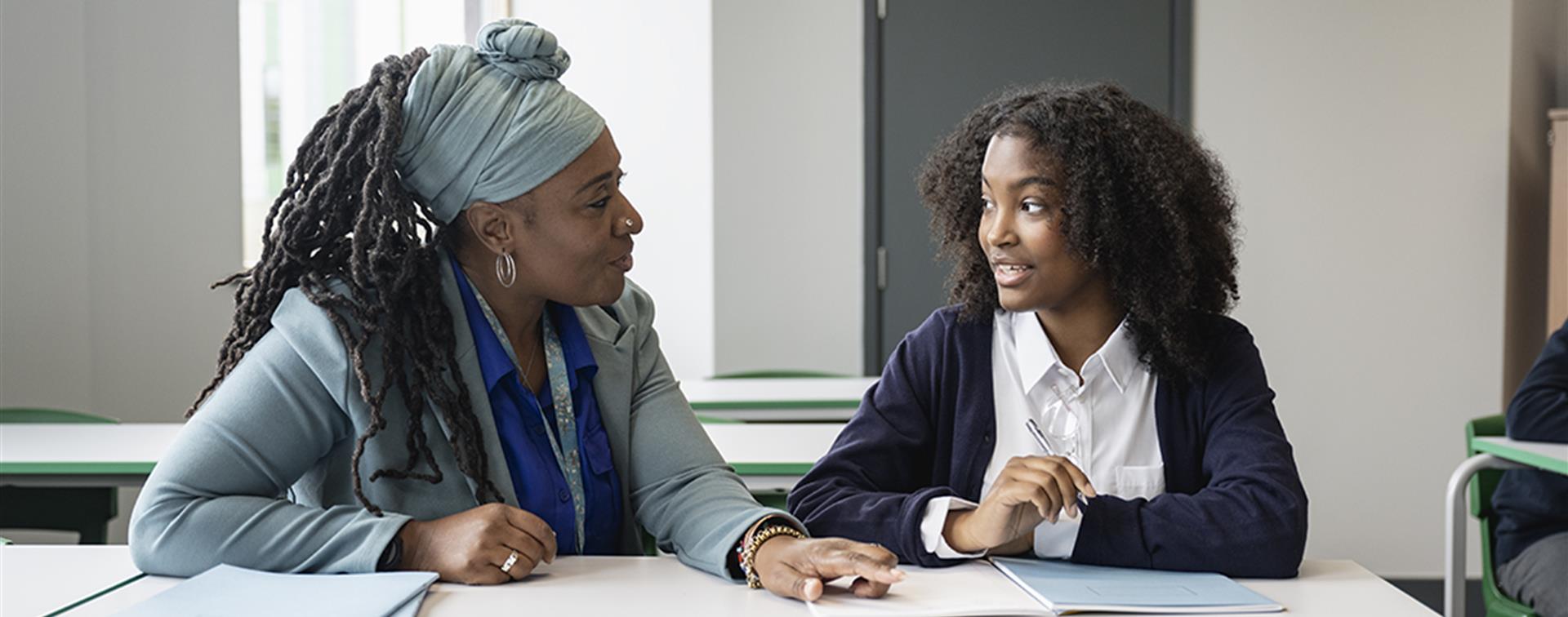 Teacher advising a student