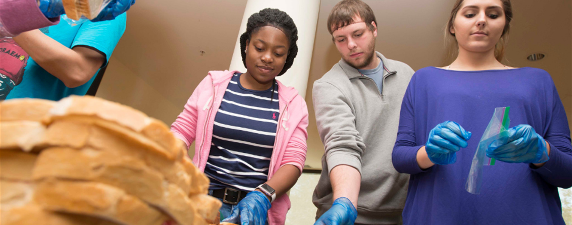 KSU Center volunteers prepare sandwiches